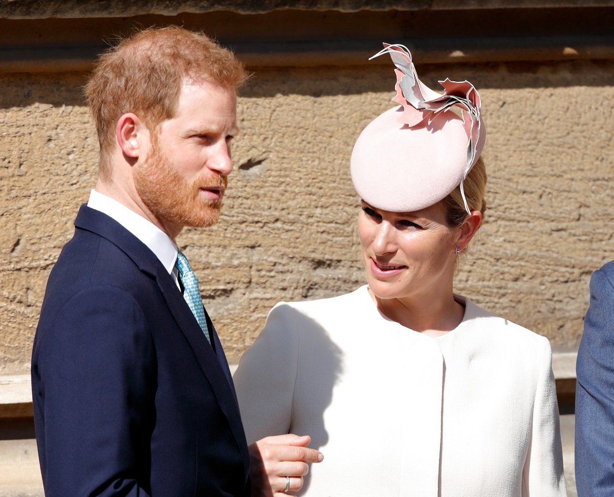 Prince Harry and Zara Tindall, who a lip-reader says made a blunt comment comparing duke's wedding to Princess Eugenie's, attend the traditional Easter Sunday church service in 2019