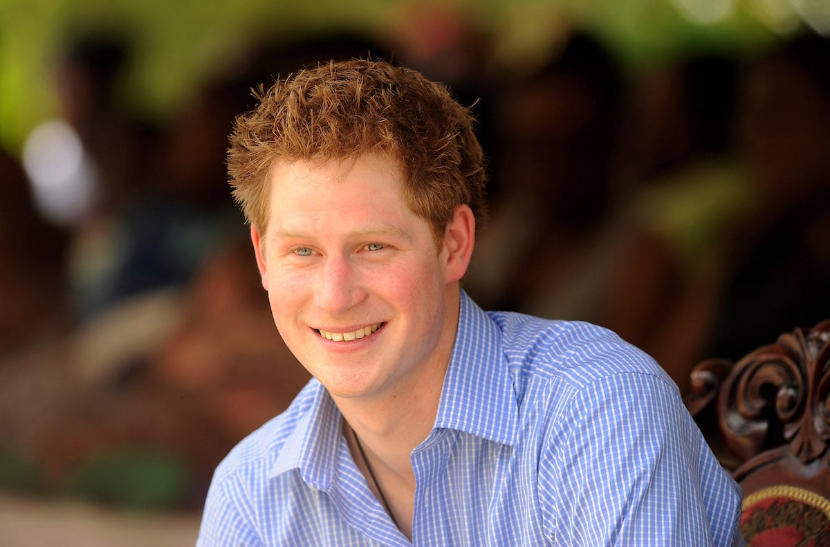 A photo of a smiling young Prince Harry, who opened up about his drug use as a teenager in his new memoir.