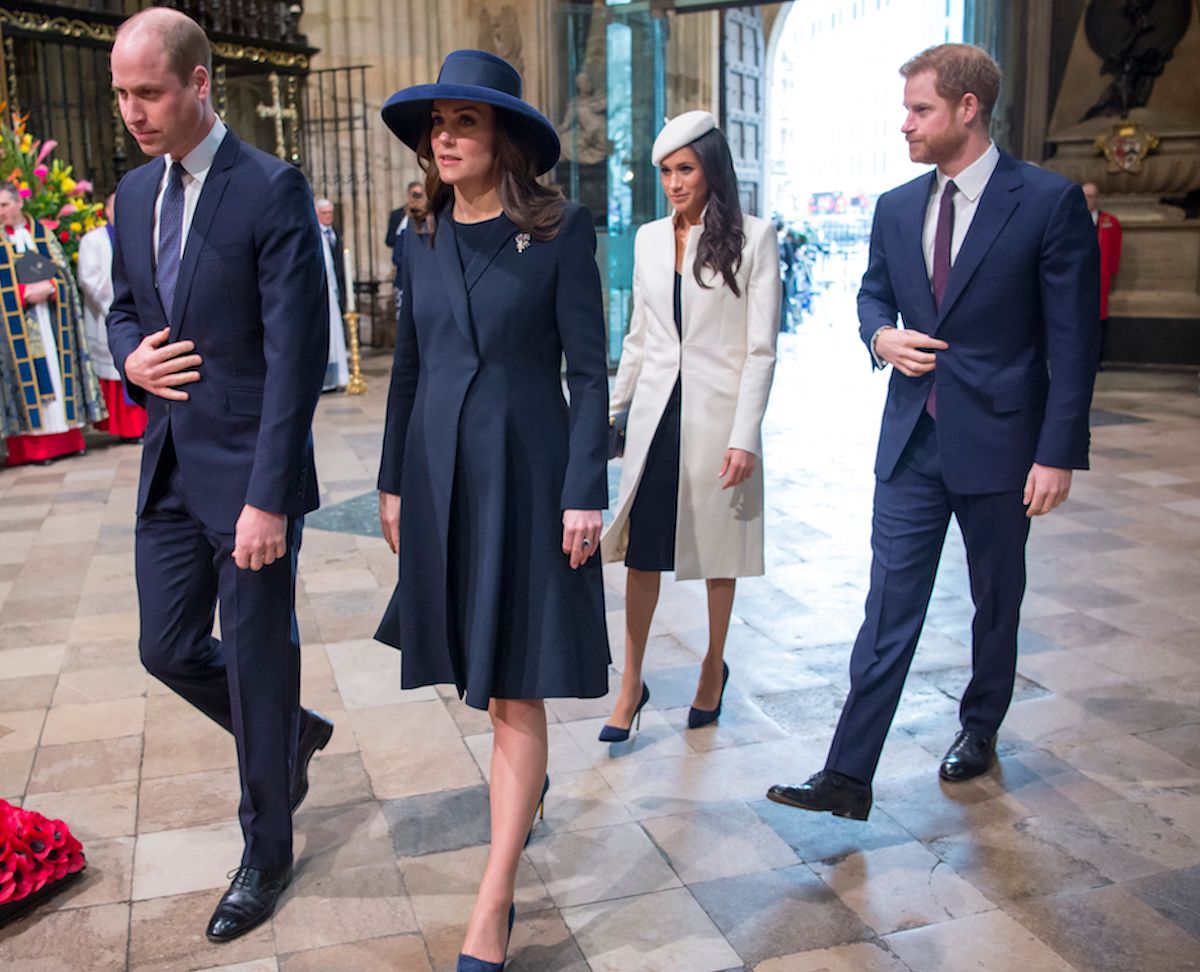 Prince Harry, who wrote in 'Spare' he noticed Meghan Markle and Kate Middleton's differing styles immediately when they met, walks with Prince William, Kate Middleton, and Meghan Markle