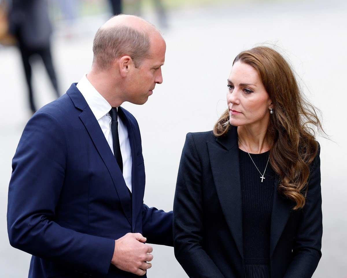 Prince William and Kate Middleton view floral tributes left at Sandringham House for the late Queen Elizabeth II