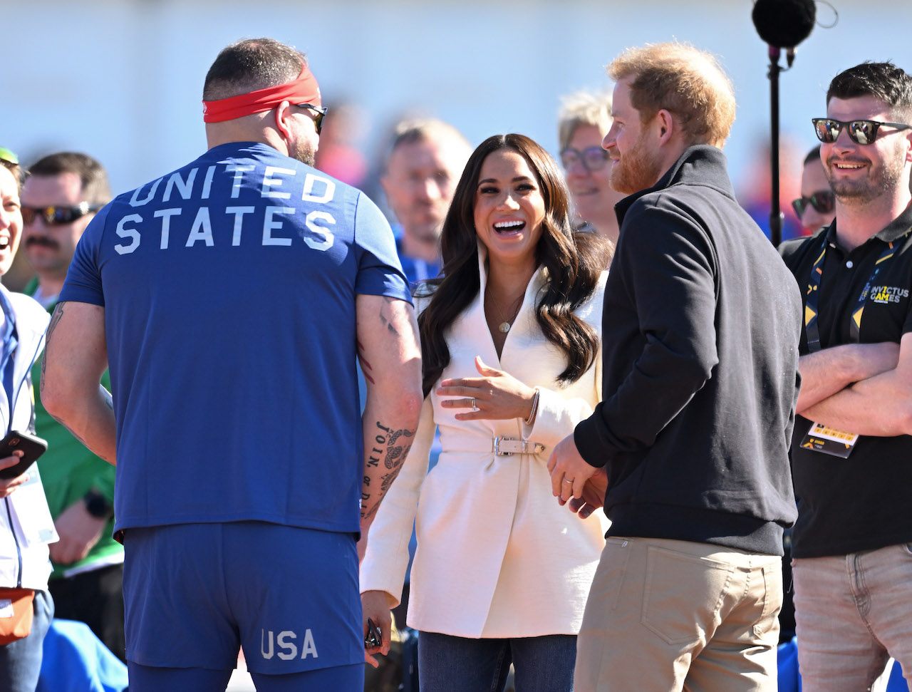 Prince Harry, Duke of Sussex and Meghan, Duchess of Sussex attend the athletics event during the Invictus Games at Zuiderpark on April 17, 2022.