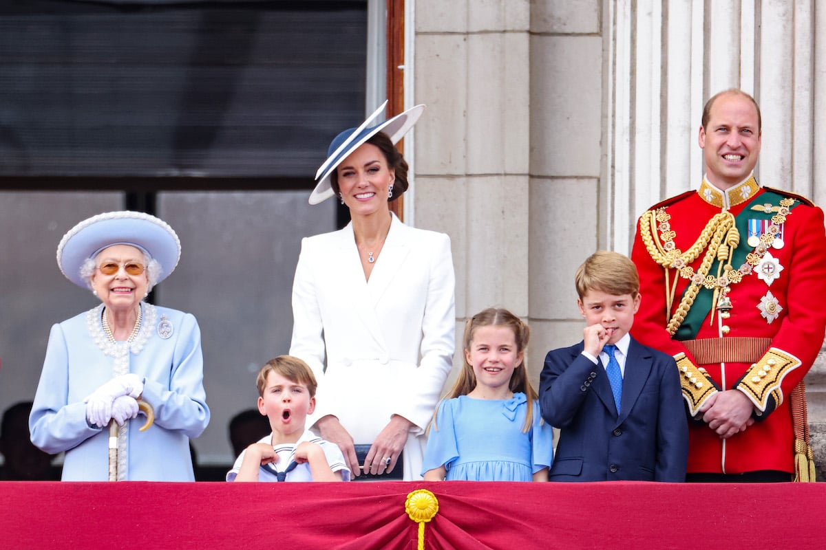 Kate Middleton and Prince William, who sent a thank you on behalf of Princess Charlotte, stand with their three children and Queen Elizabeth II 