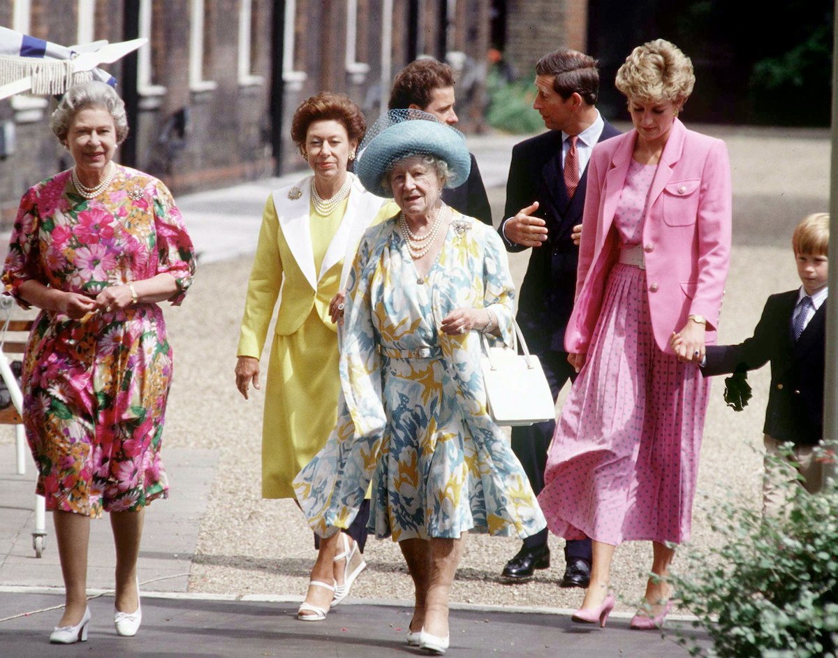 Prince Harry, who said he and Princess Margaret should've been friends in 'Spare', walks with Princess Margaret, Queen Elizabeth II, Queen Mother, David Armstrong-Jones, King Charles III, and Princess Diana.