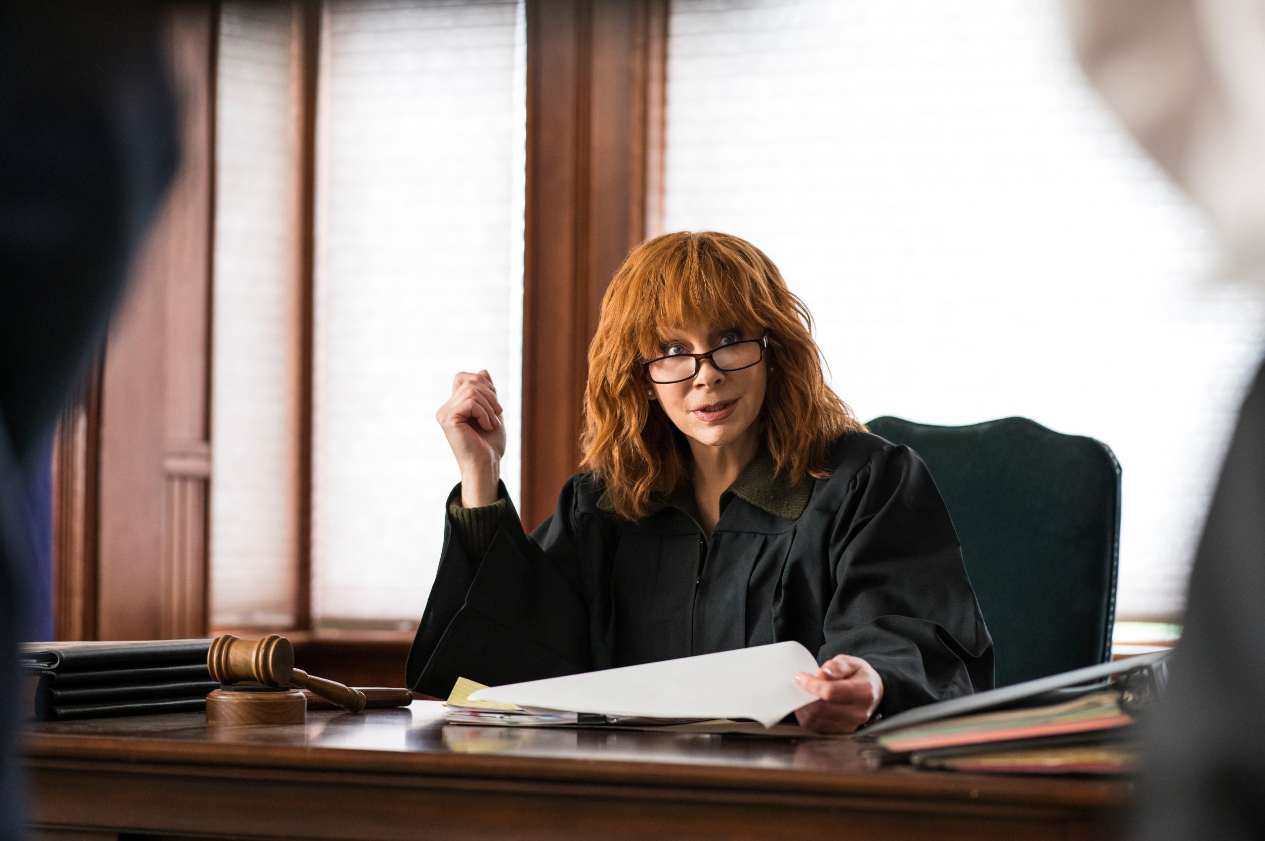 Reba McEntire wearing judge's robes in the Lifetime movie 'The Hammer'