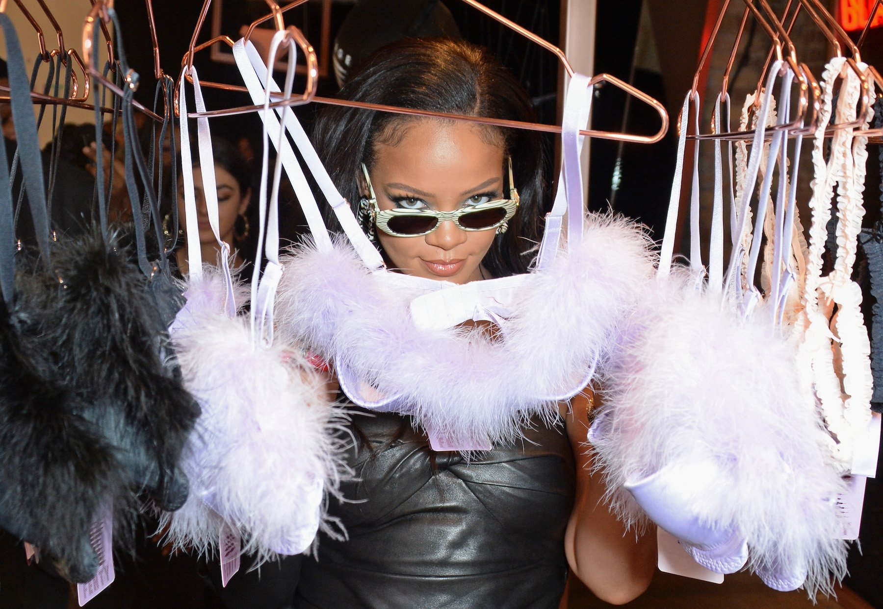 Super Bowl halftime performer Rihanna posing with Savage X Fenty clothing