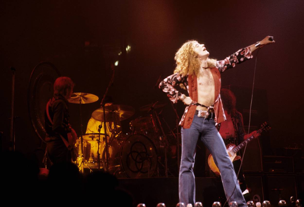 Led Zeppelin frontman Robert Plant stands in the spotlight during a 1975 concert at the Richfield Coliseum