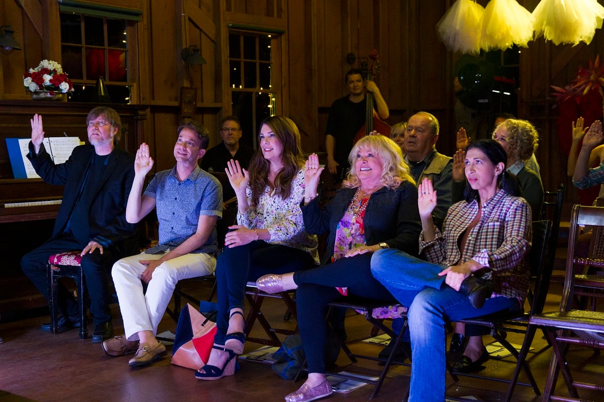 Lauren Graham, Sally Struthers, and Rose Abdoo sit together in Mss Patty's dance studio during a scene in 'Gilmore Girls: A Year in the Life'