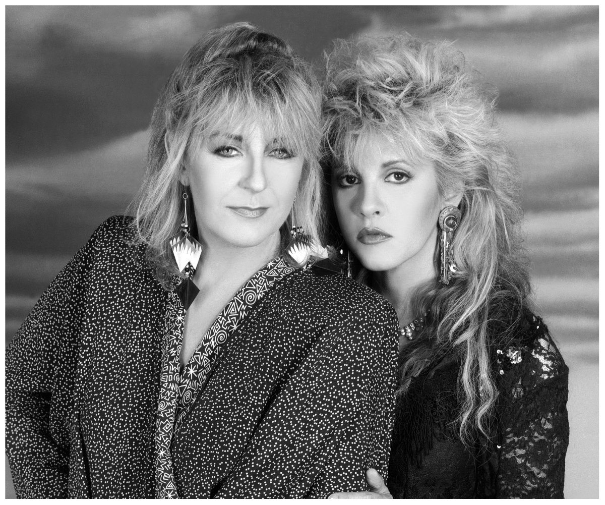 A black and white photo of Fleetwood Mac stars Christine McVie and Stevie Nicks.