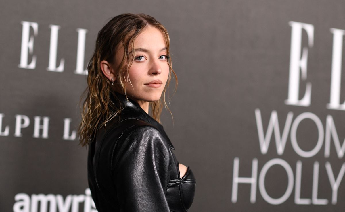Sydney Sweeney wearing a black leather outfit