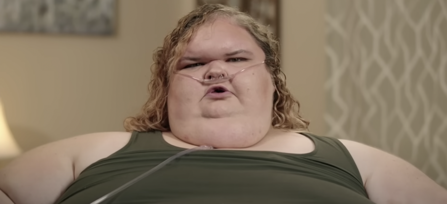 Tammy Slaton from '1000-Lb Sisters' Season 4 wearing a green dress and sitting in a wheelchair