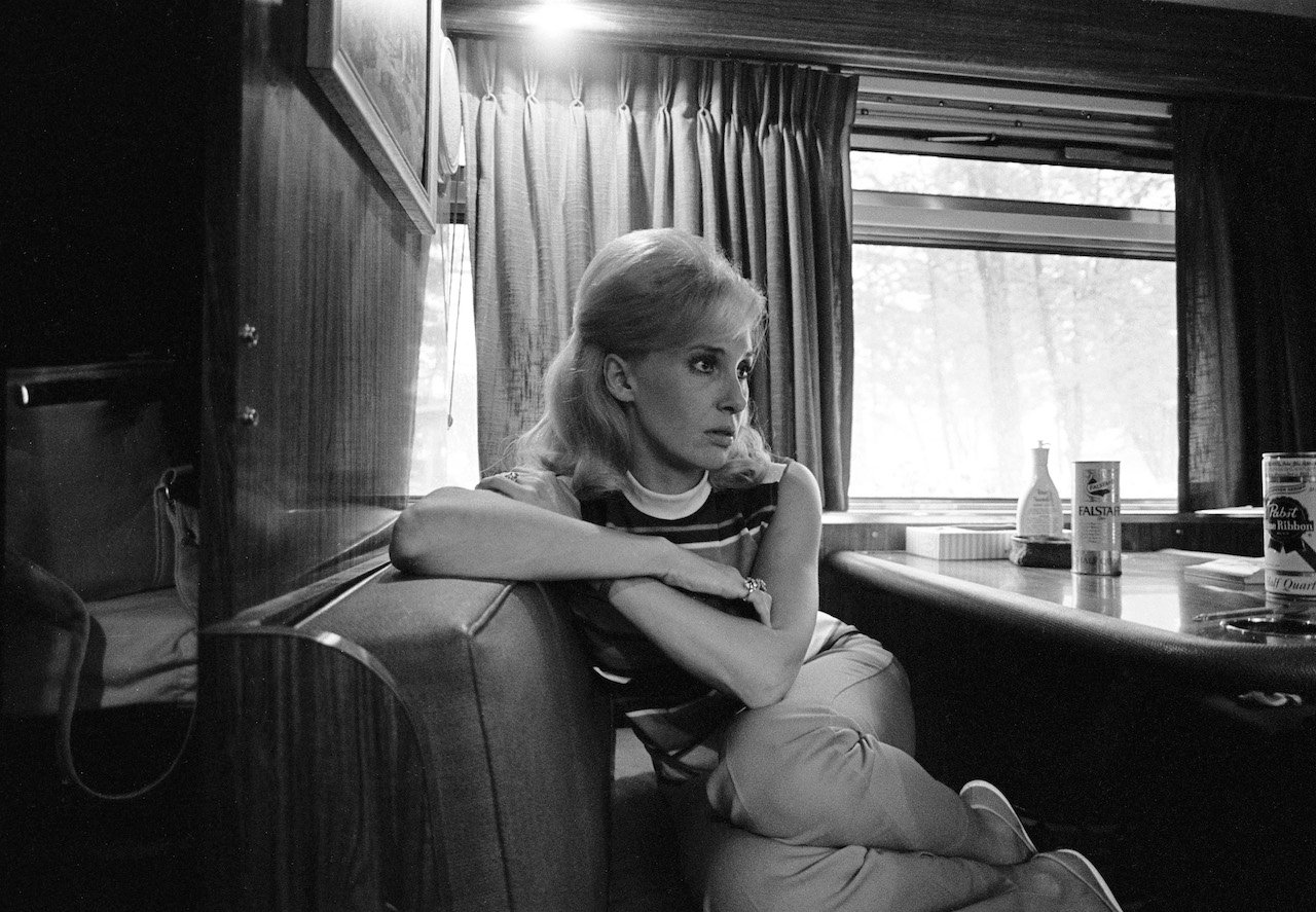 Tammy Wynette sitting on her tour bus, c. 1971.