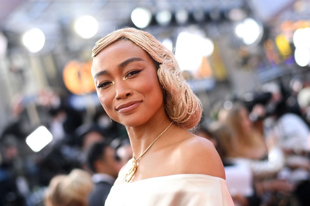 Actor Tati Gabrielle attends the 94th Oscars in a taupe dress