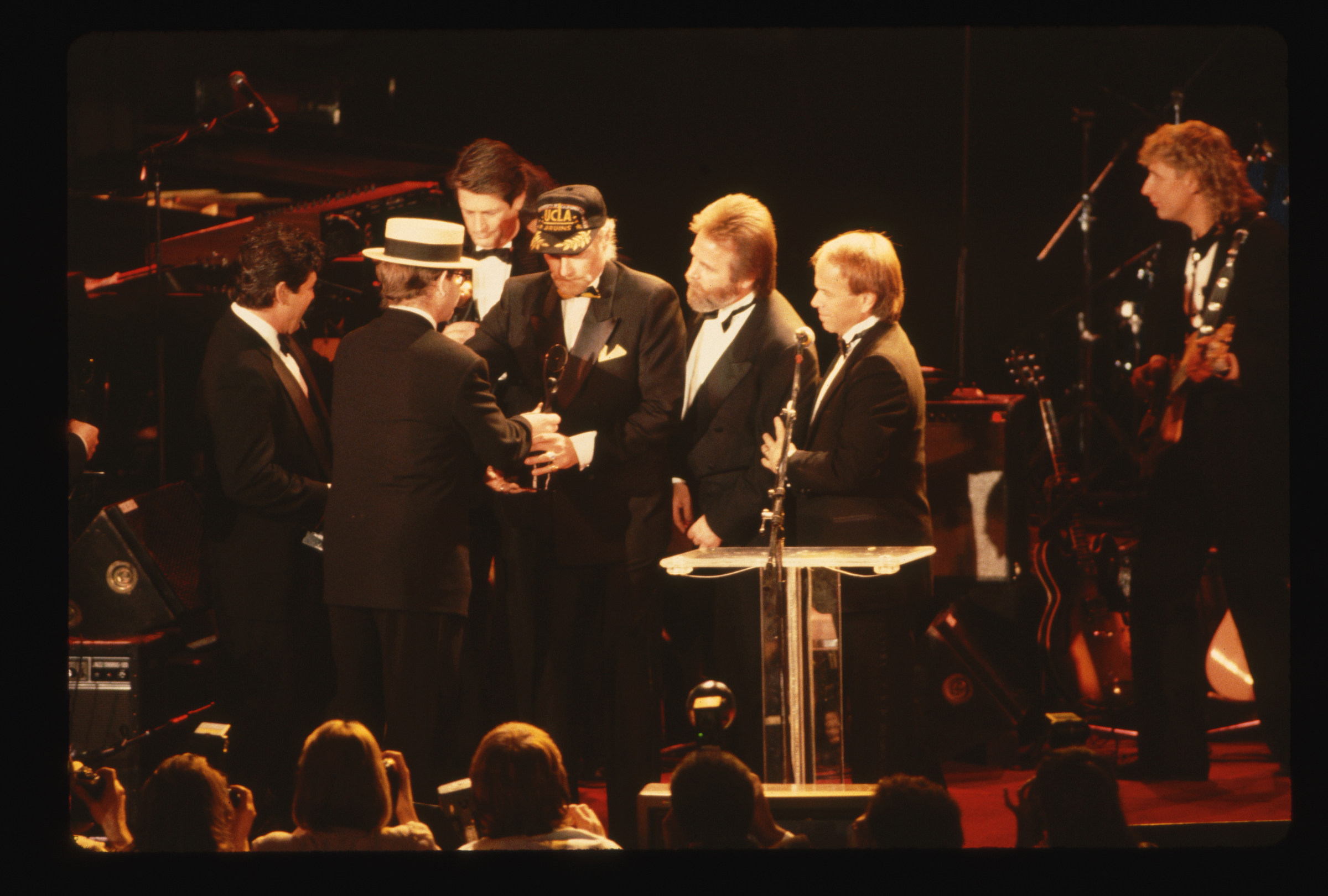 Singer Elton John presents The Beach Boys with trophies