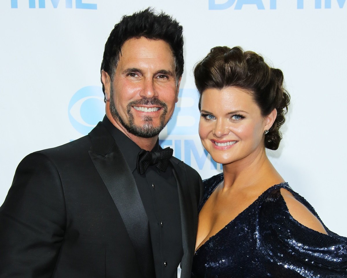 'The Bold and the Beautiful' star Don Diamont in a black suit and Heather Tom in a blue dress; posing together on the red carpet.