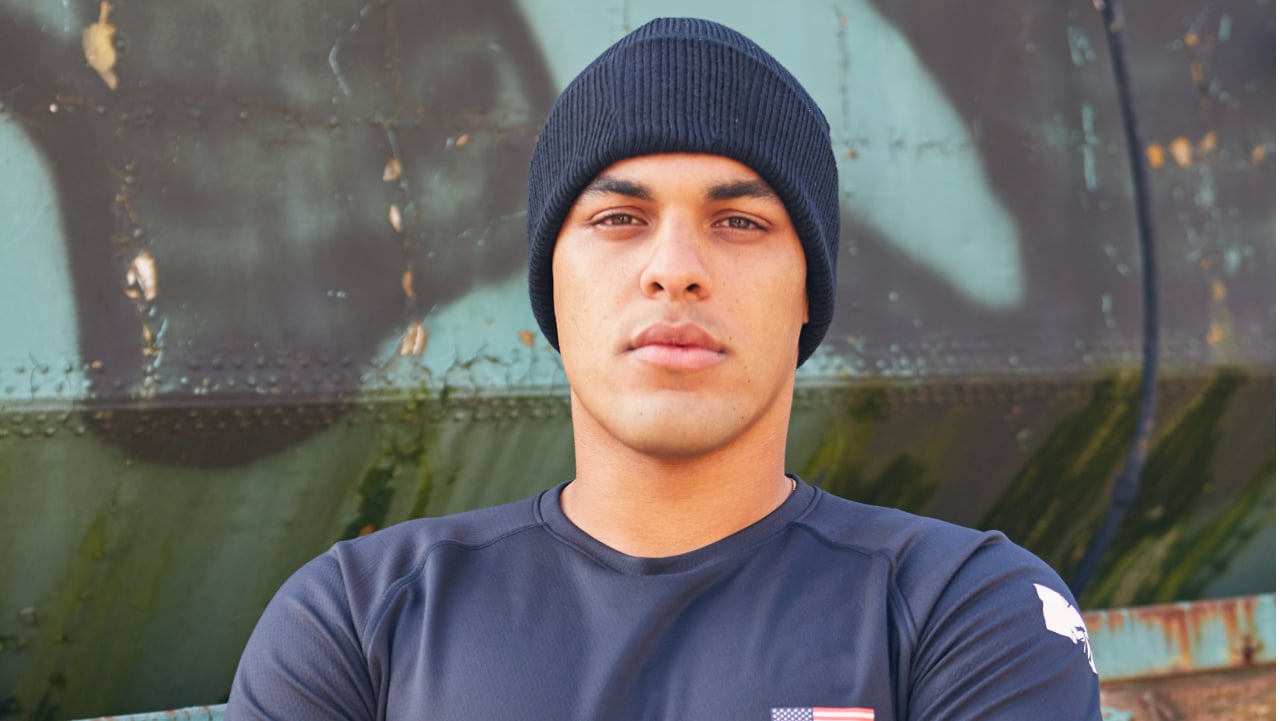 Josh Martinez posing for 'The Challenge' cast photo