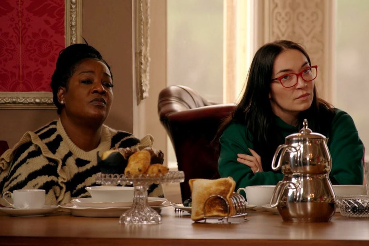 Cirie Fields and Amanda Clark, who star in 'The Traitors' on Peacock, sit at the breakfast table.