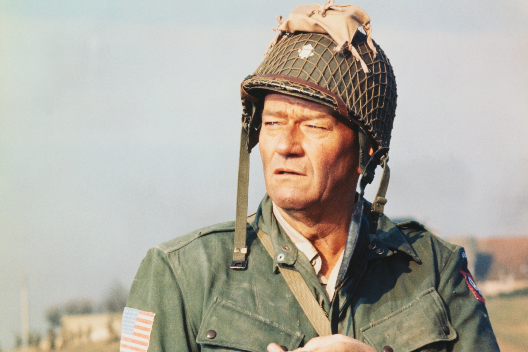 'The Longest Day' John Wayne advice squinting his eyes, wearing a war uniform
