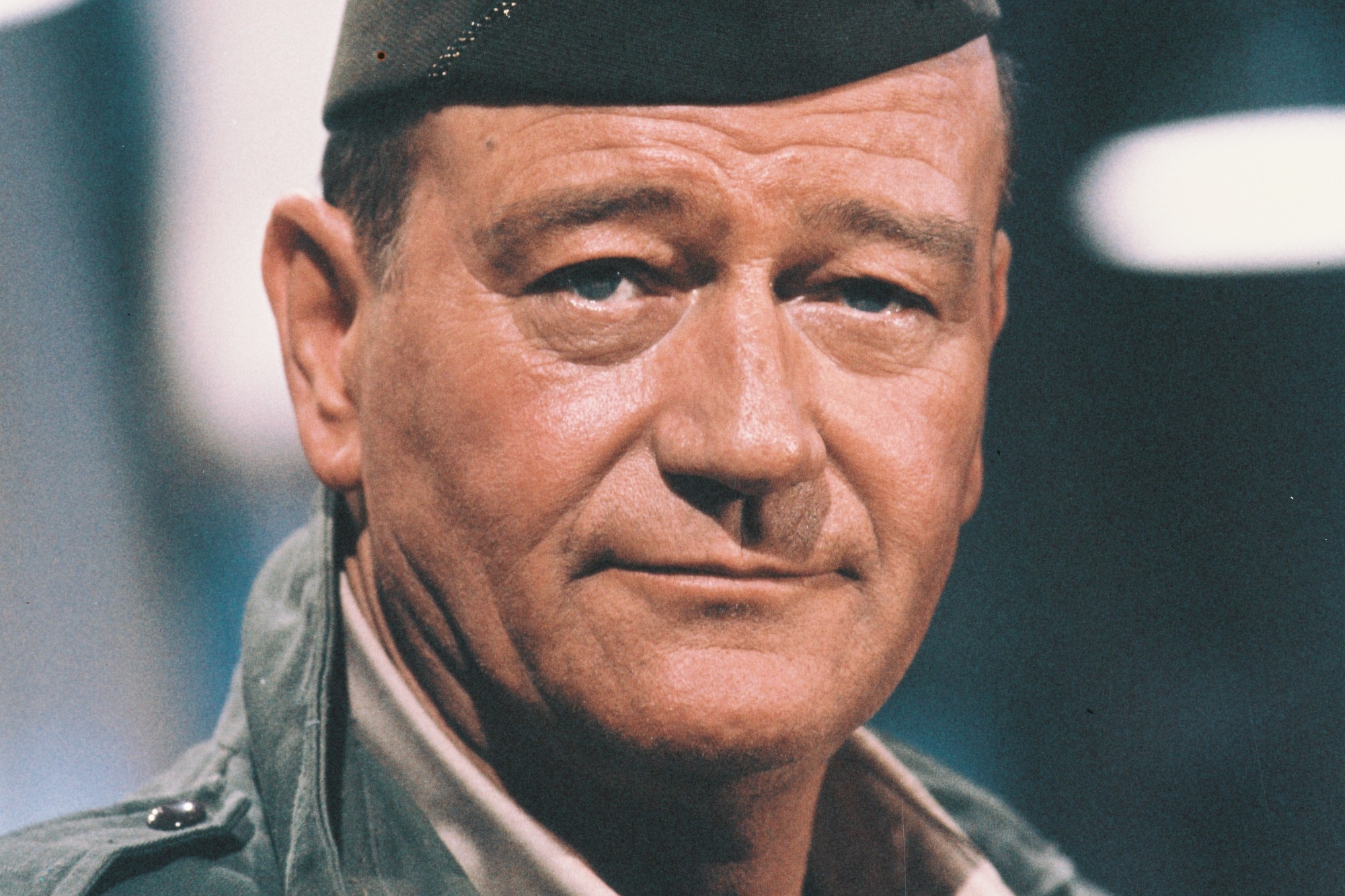 'The Longest Day' actor John Wayne playing hero Lieutenant Colonel Benjamin Vandervoort with a plain expression, wearing a uniform