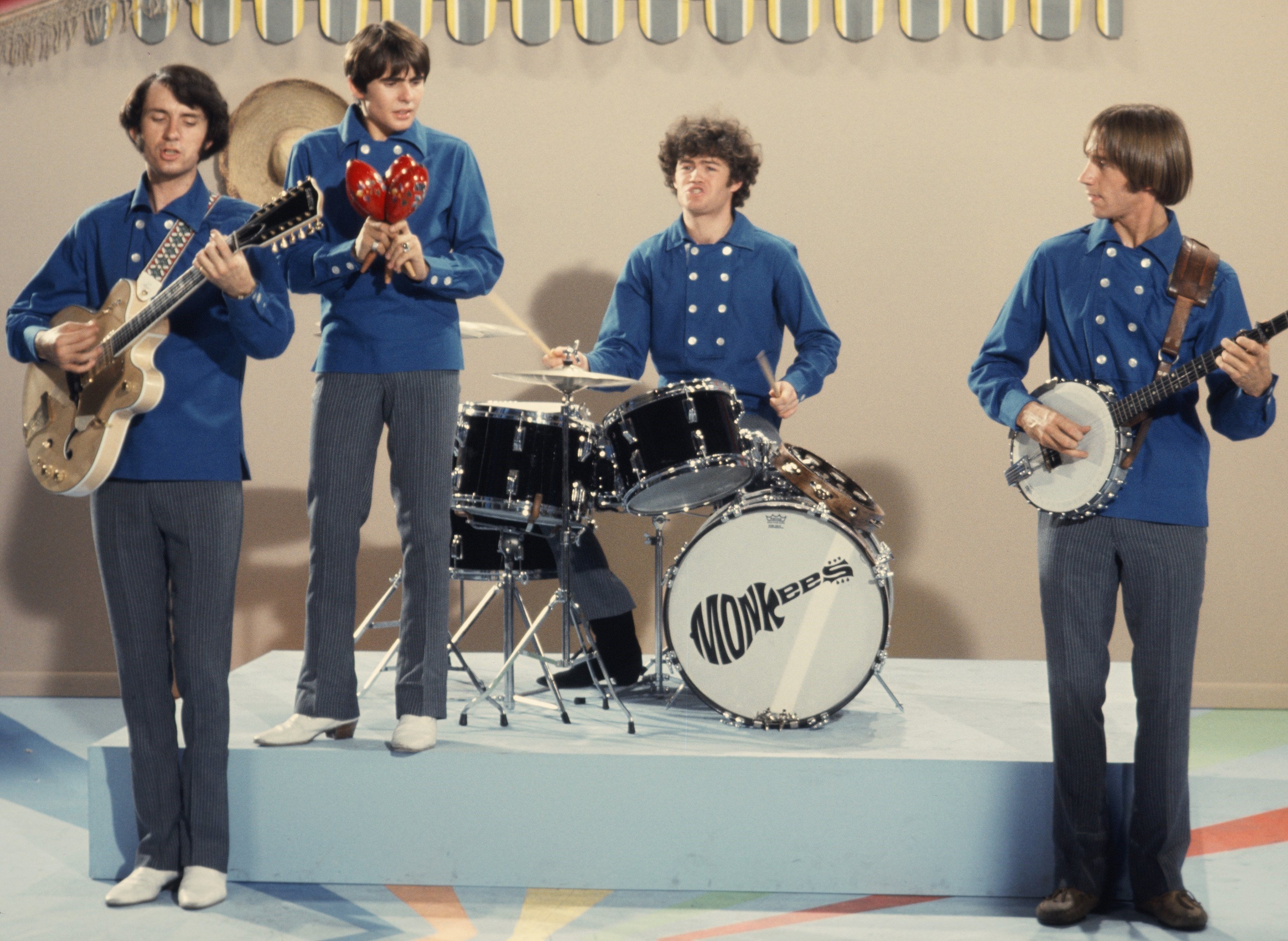 The Monkees wearing blue