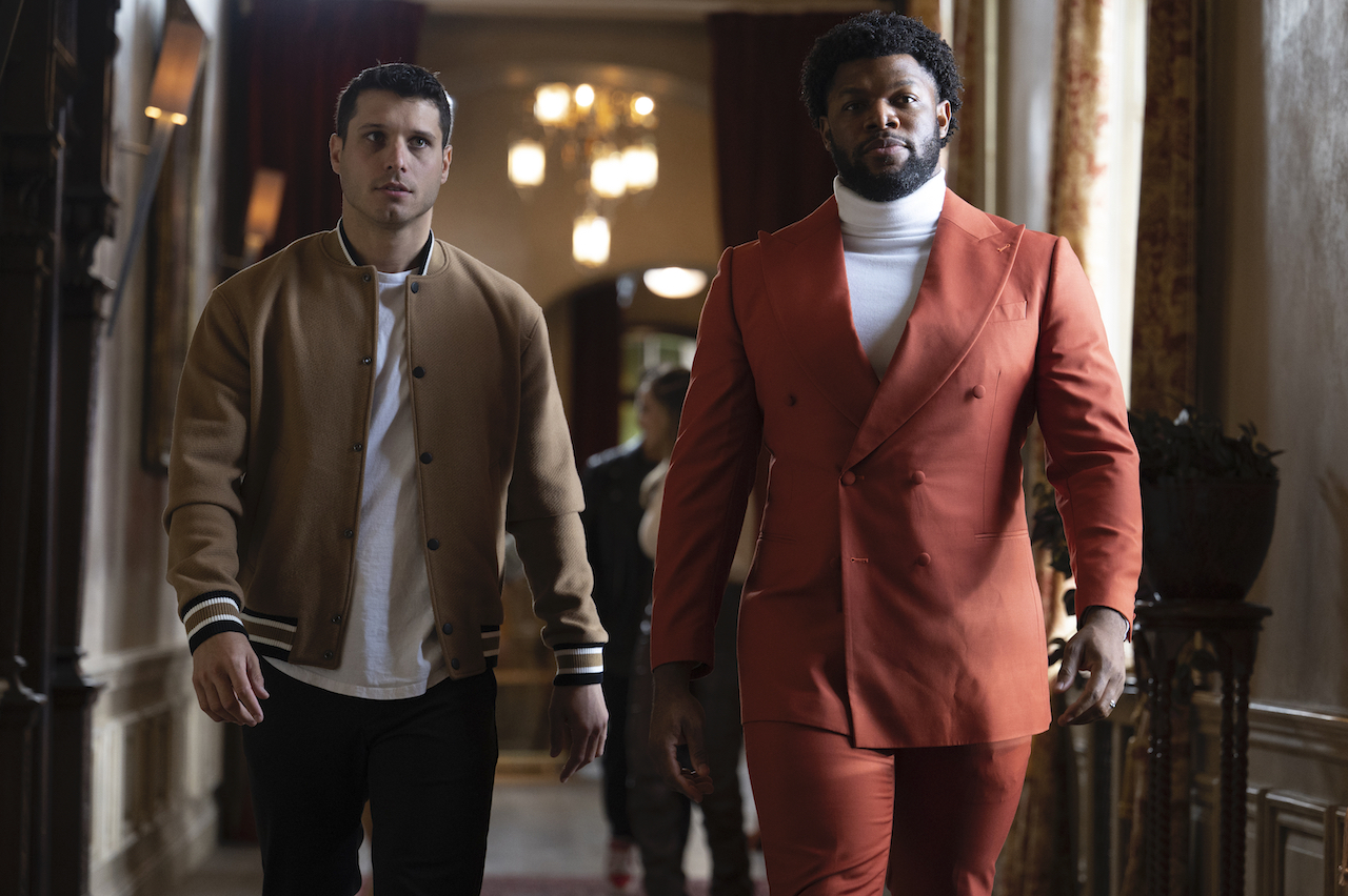 Cody Calafiore and Quentin Jiles walk in a hallway together on 'The Traitors'.