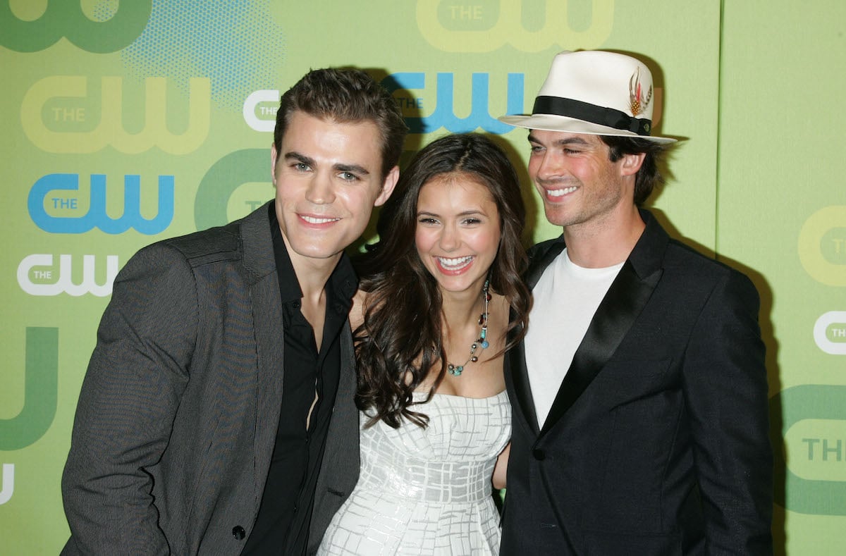 Actors Paul Wesley, Nina Dobrev, and Ian Somerhalder laugh at the 2009 The CW Network UpFront event
