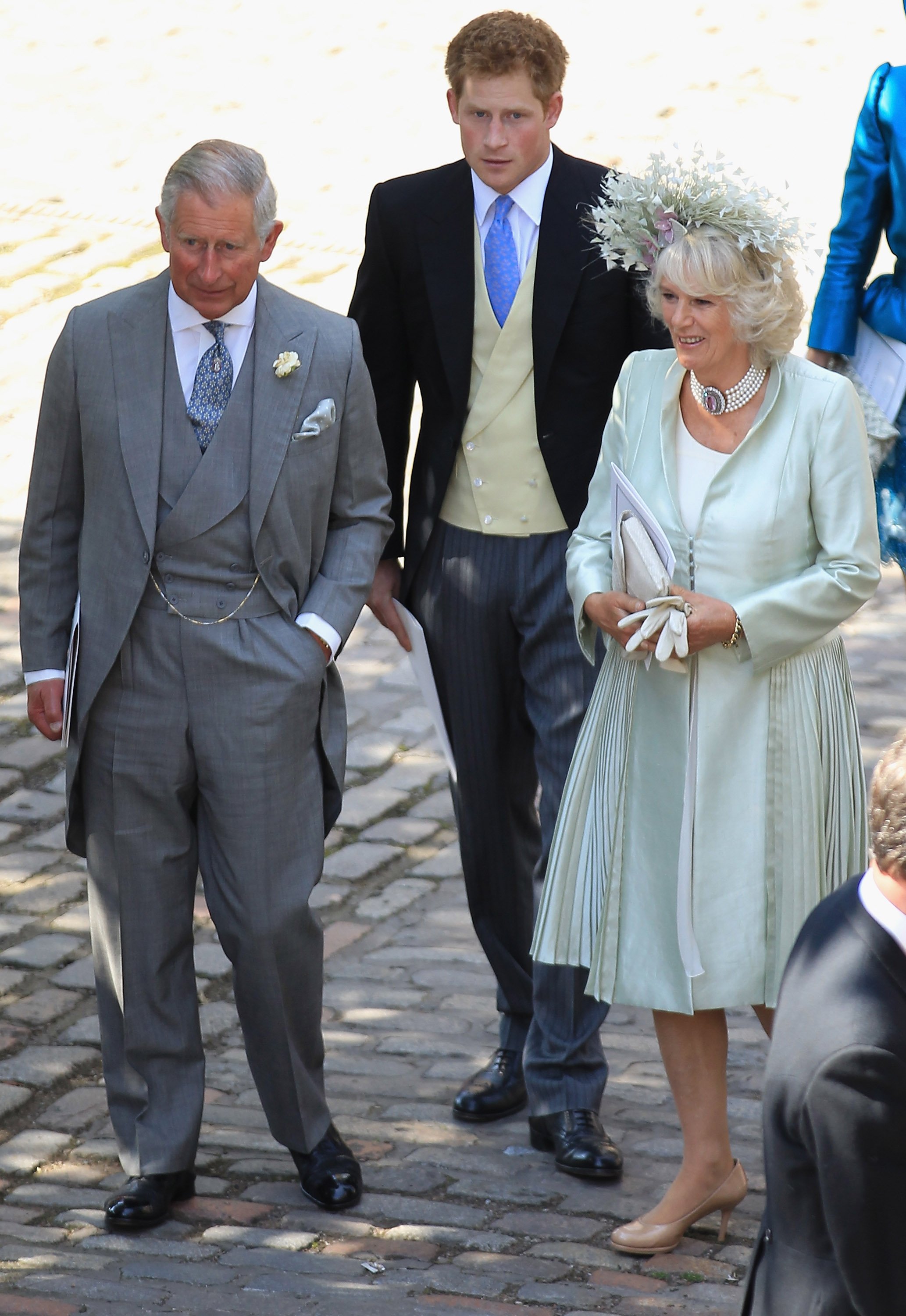 Then-Prince Charles, Prince Harry, and Camilla Parker Bowles at the wedding of Mike Tindall and Zara Philips