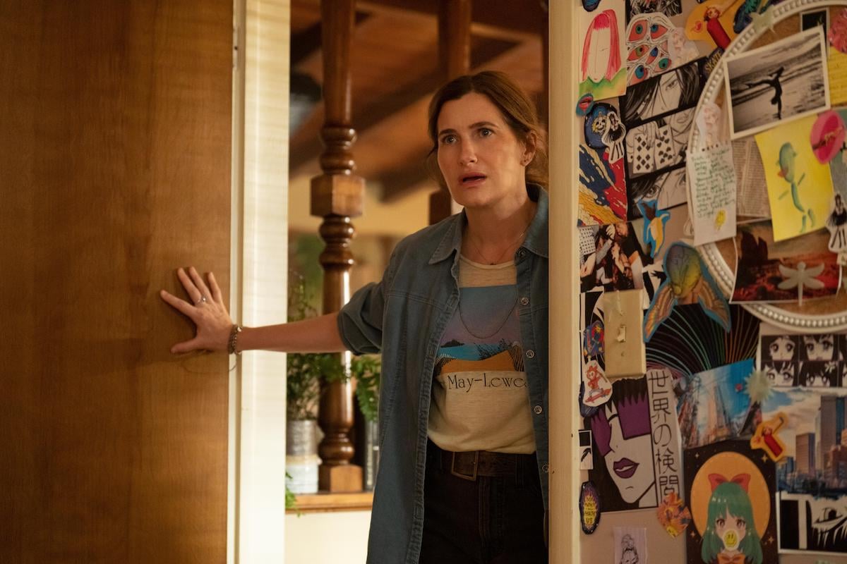 Kathryn Hahn standing in a doorway in Hulu's book-to-TV adaptation of 'Tiny Beautiful Things'