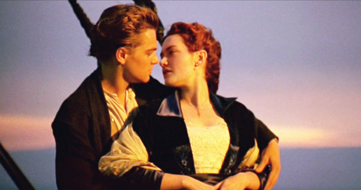 Leonardo DiCaprio as Jack and Kate Winslet as Rose film a scene for Titanic in 1997