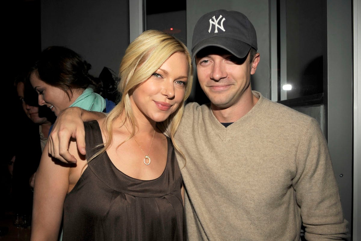Laura Prepon and Topher Grace smile for the camera in 2008