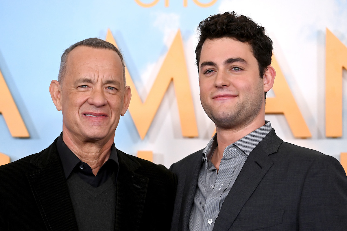 Truman Hanks and Tom Hanks smile at the premiere of "A Man Called Otto"