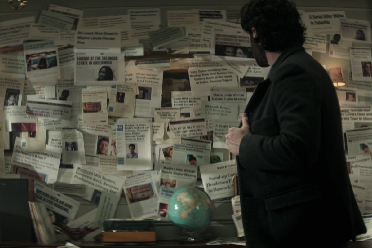 In the You Season 4 trailer, Joe looks at a wall full of newspaper clippings about his past.