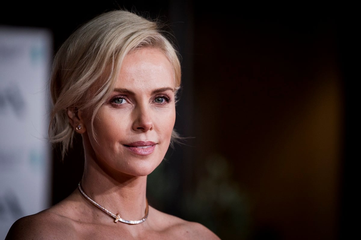Why ‘Showgirls’ Director Said Charlize Theron Was ‘Very Lucky’ She Didn’t Get Elizabeth Berkley’s Part