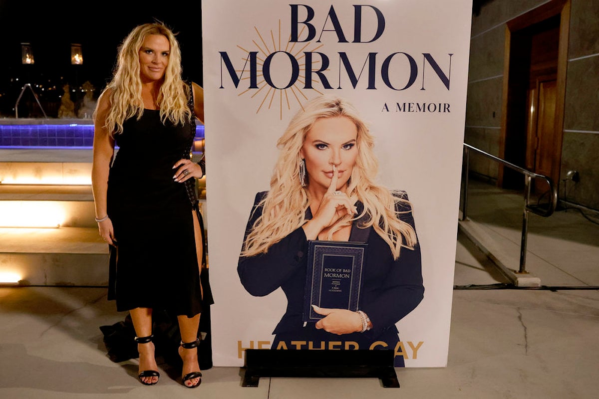 Heather Gay poses with the cover for her book 'Bad Mormon' in the season 3 finale of 'The Real Housewives of Salt Lake City'