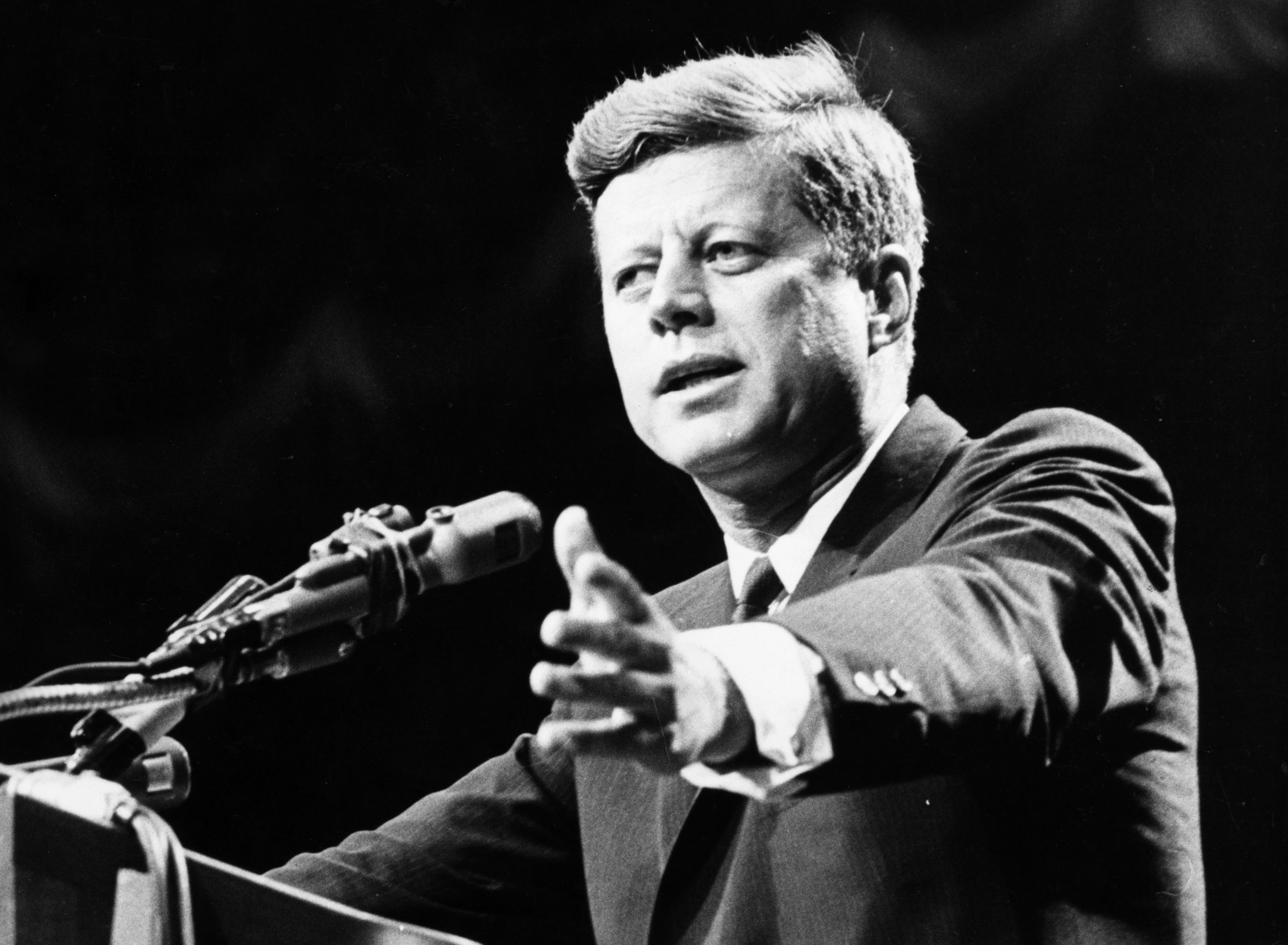 President John F. Kennedy at a podium