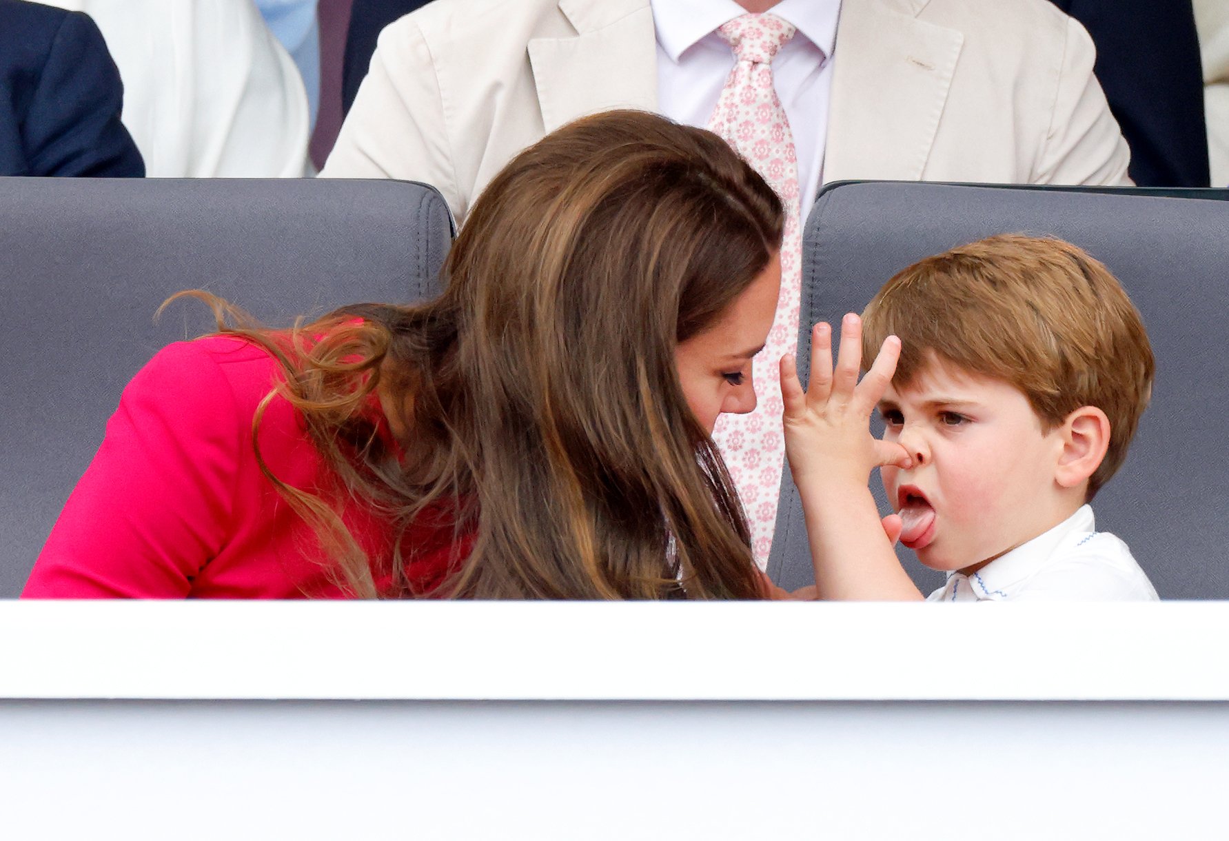 Prince Louis 'thumbs his nose' and sticks his tongue out at Kate Middleton during the Platinum Pageant on The Mall on June 5, 2022 in London, England. 