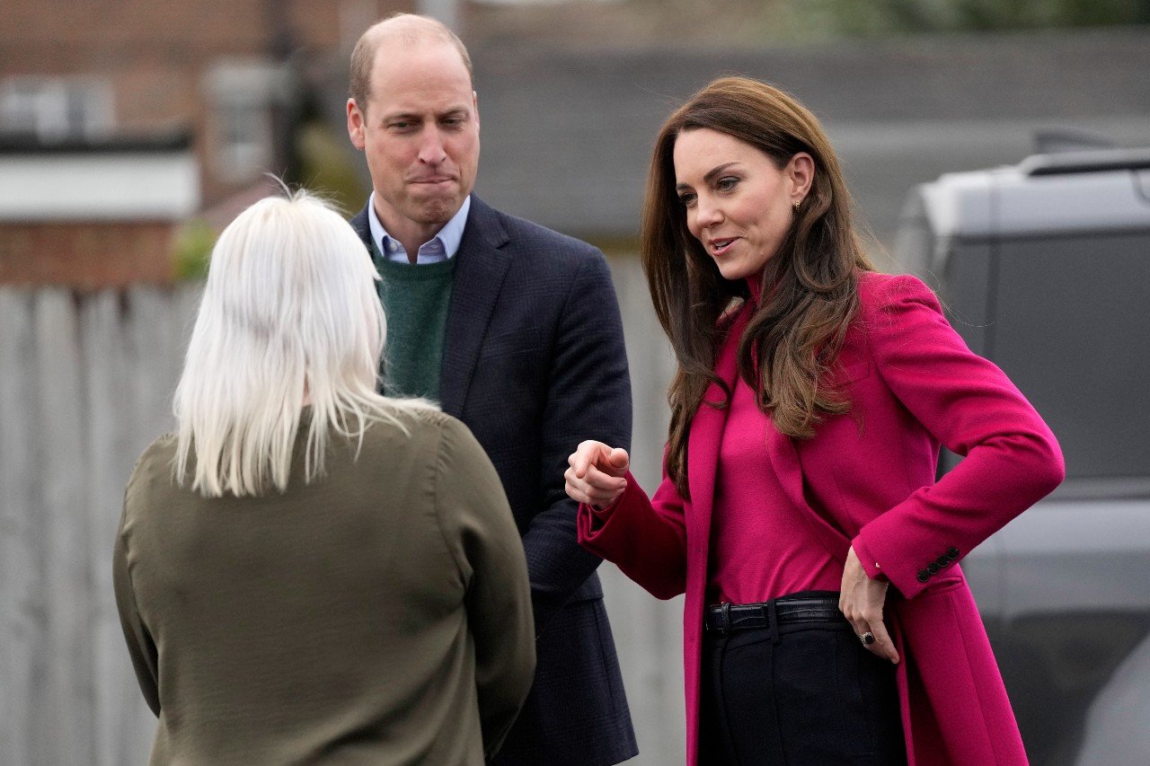 Kate Middleton and Prince William visit a food bank.