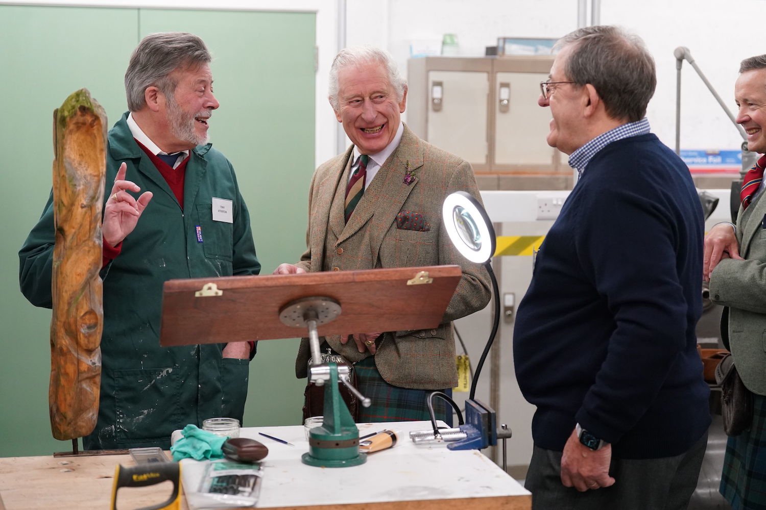 King Charles body language including smiling during appearance following Prince Harry book Spare