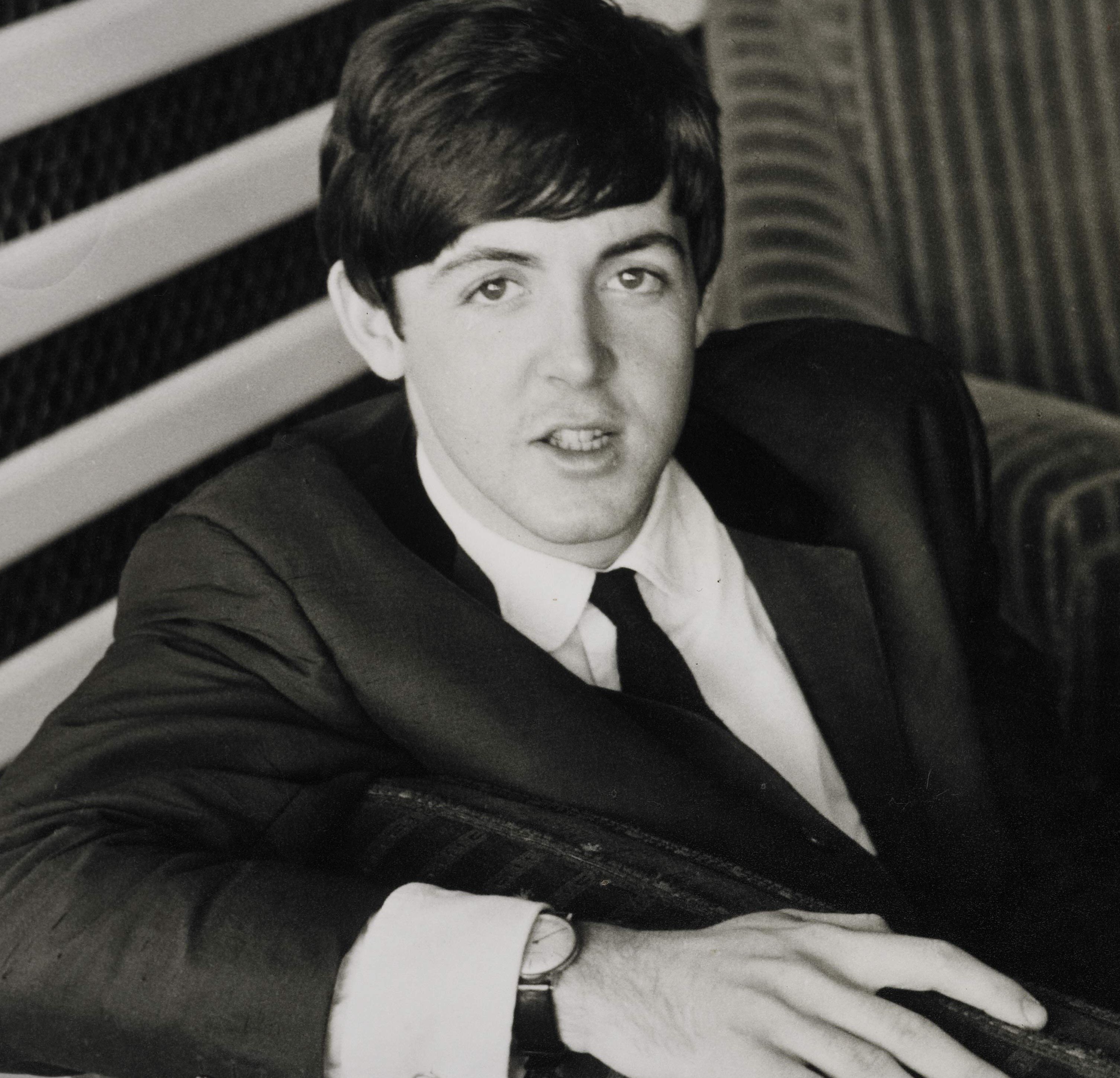 Paul McCartney wearing a suit