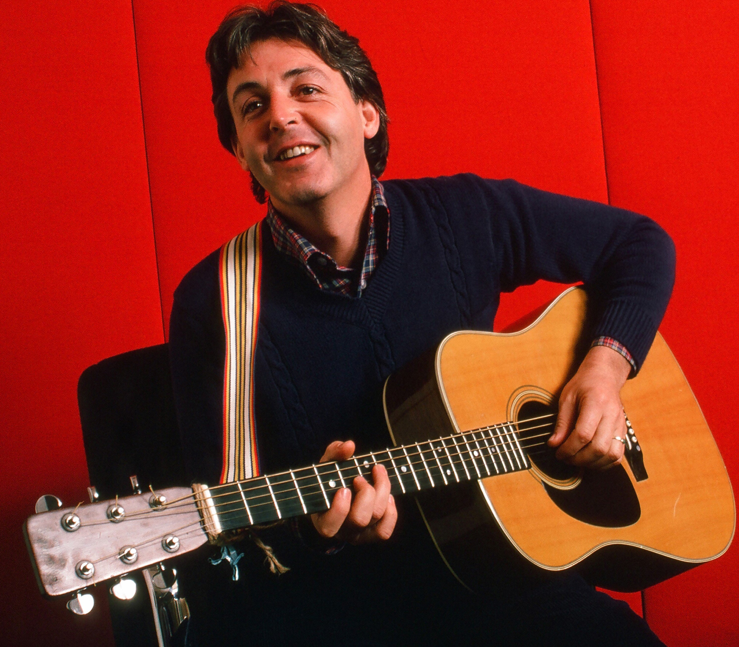 Paul McCartney with a guitar during the "Temporary Secretary" era