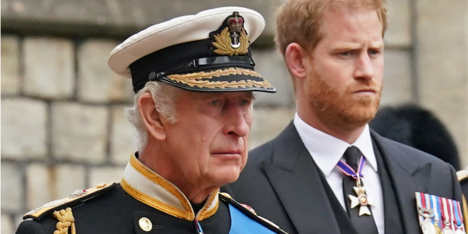 King Charles III and Prince Harry at Queen Elizabeth II's funeral procession.
