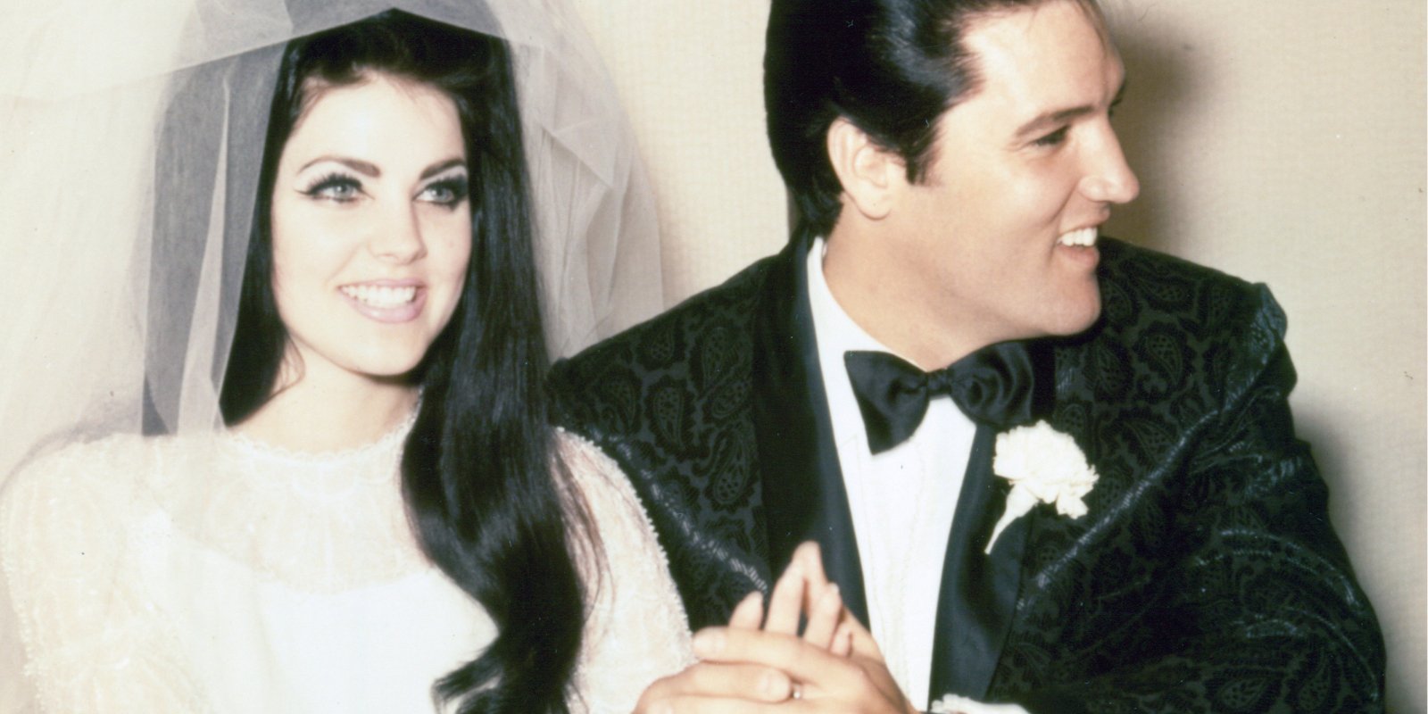 Priscilla and Elvis Presley pose on their wedding day in 1967 in Las Vegas, Nevada.