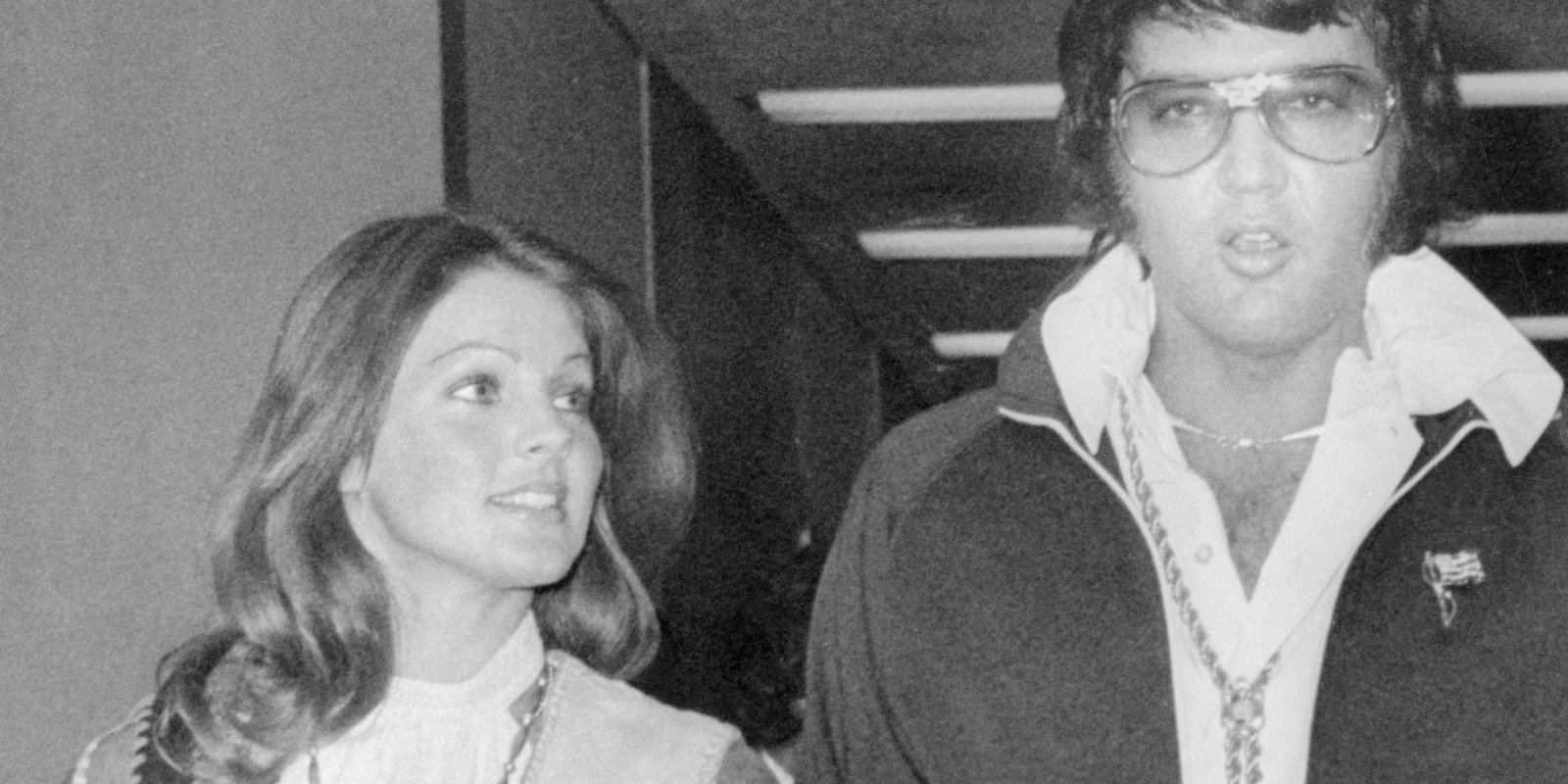 Priscilla and Elvis Presley the day of their 1975 divorce walking out of the court proceedings together.