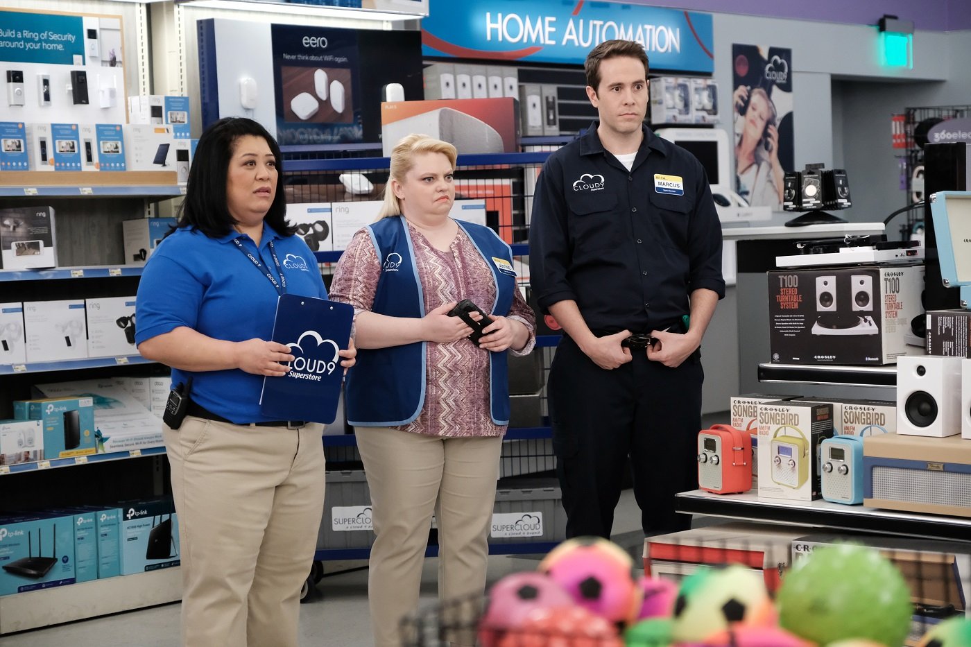 Sandra, Justine and Marcus stand in Cloud 9 Uniforms during an episode of 'Superstore' a reunion is not yet in the works.