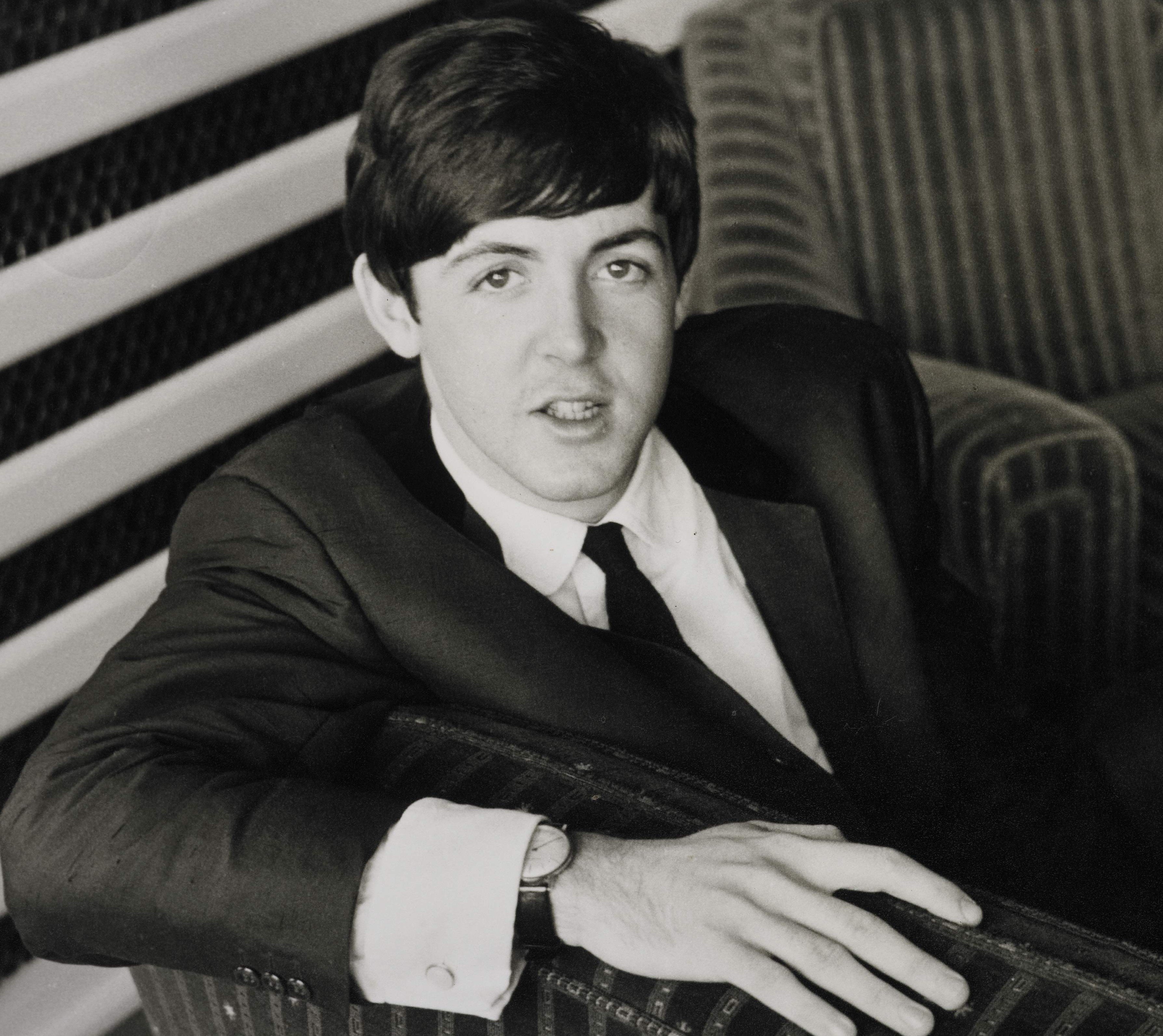 Paul McCartney in a suit during The Beatles' "Eleanor Rigby" era