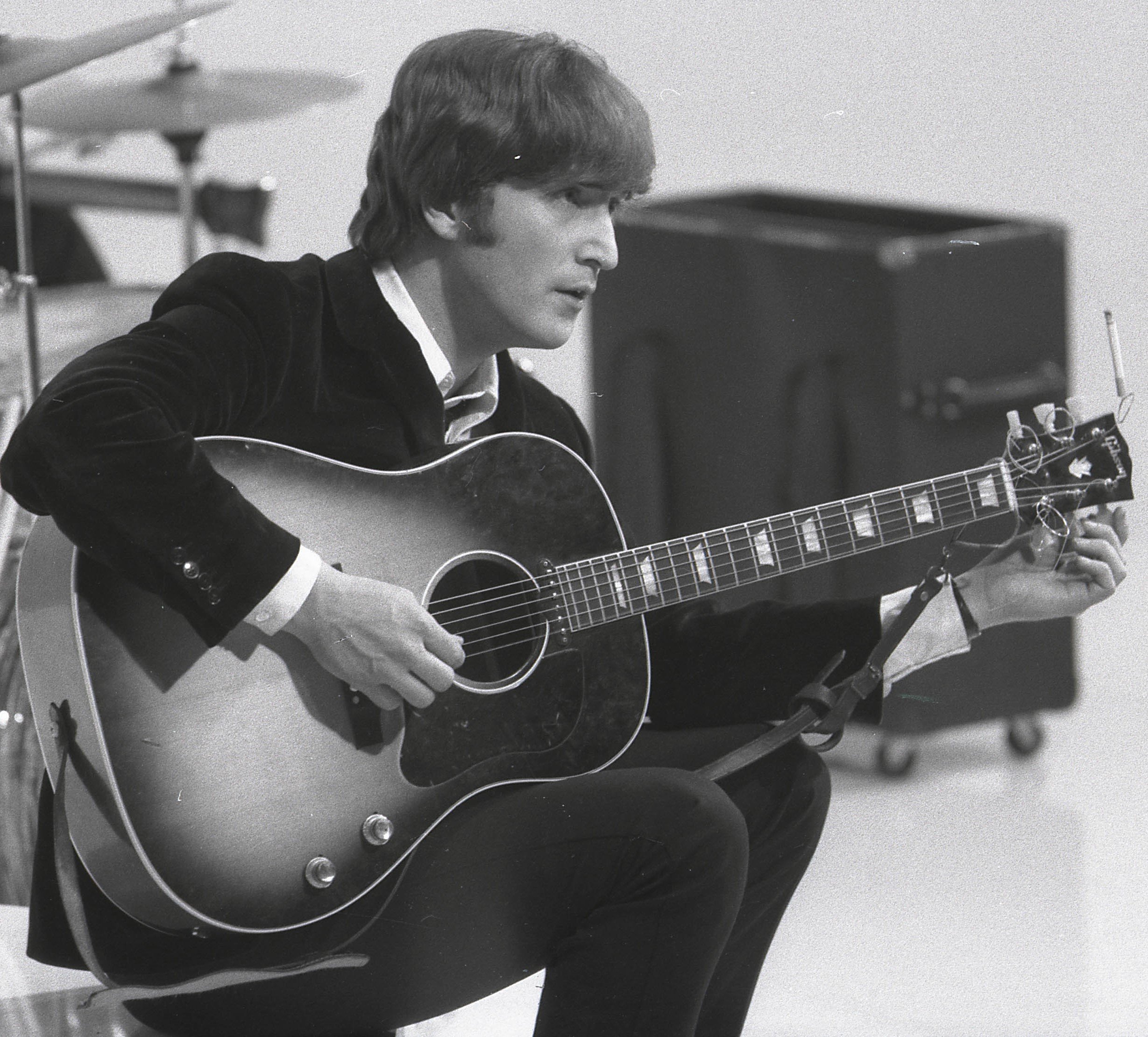 The Beatles' John Lennon with a guitar