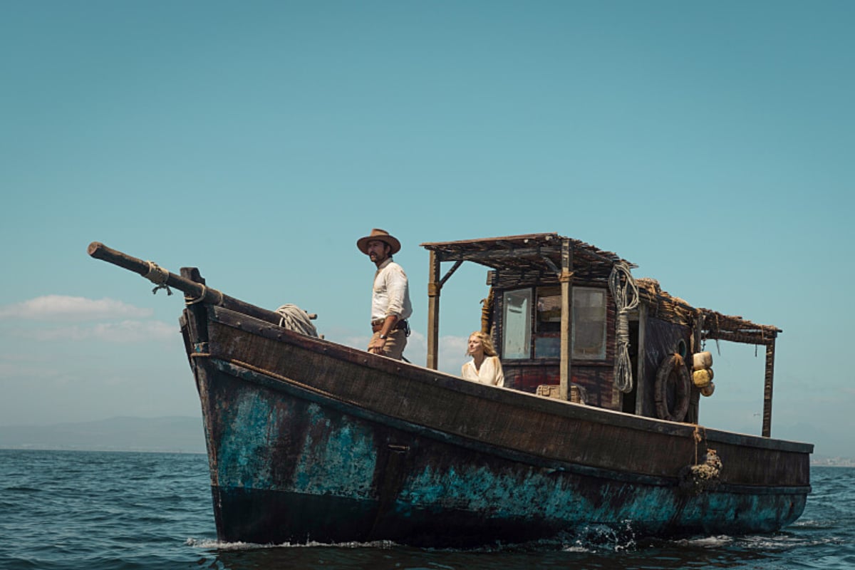 In 1923 Episode 5, Spencer and Alex stand on board a tugboat before it runs into a ghost ship.