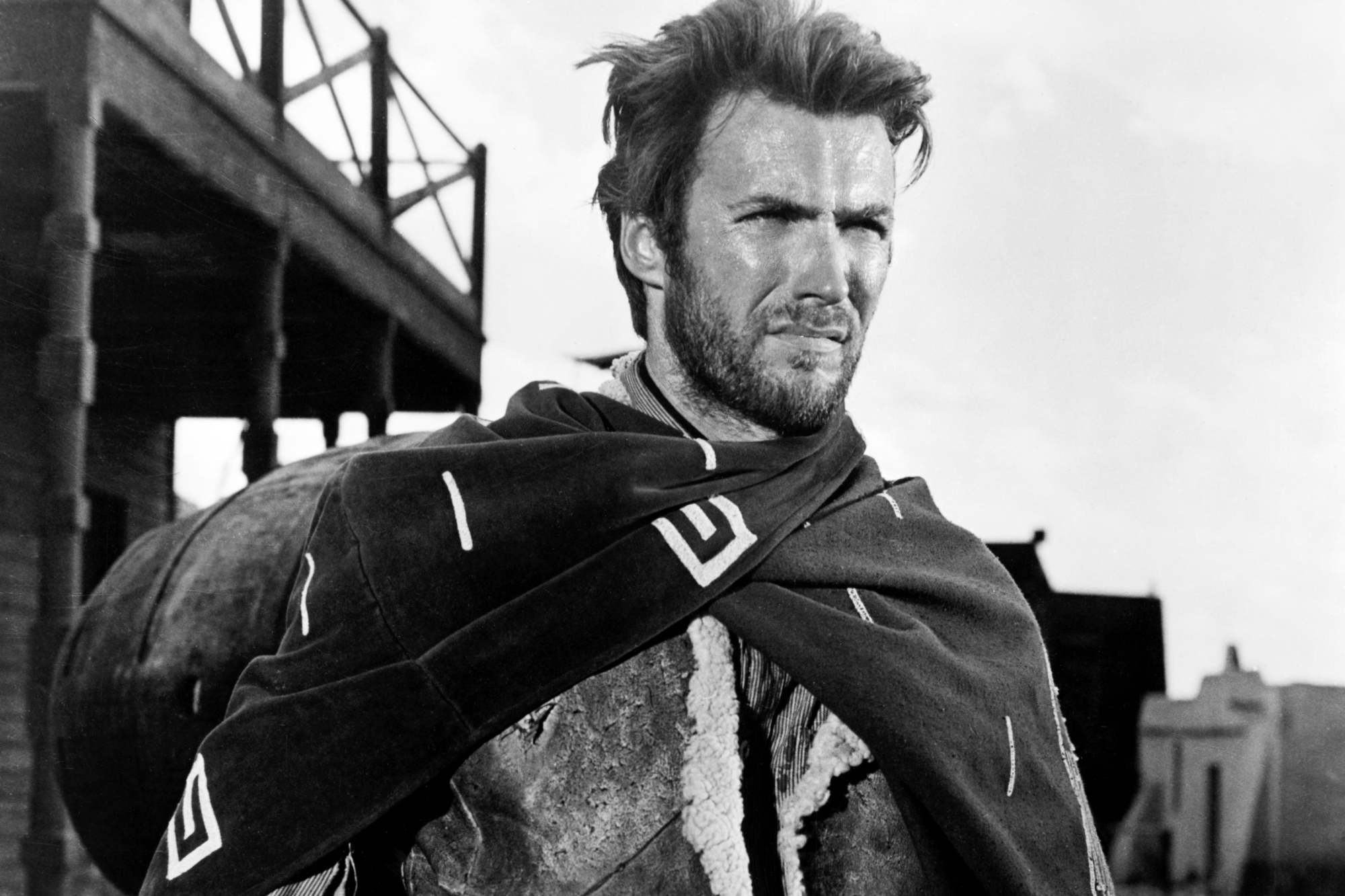 'A Fistful of Dollars' Clint Eastwood as Joe in a black-and-white picture wearing a poncho and squinting