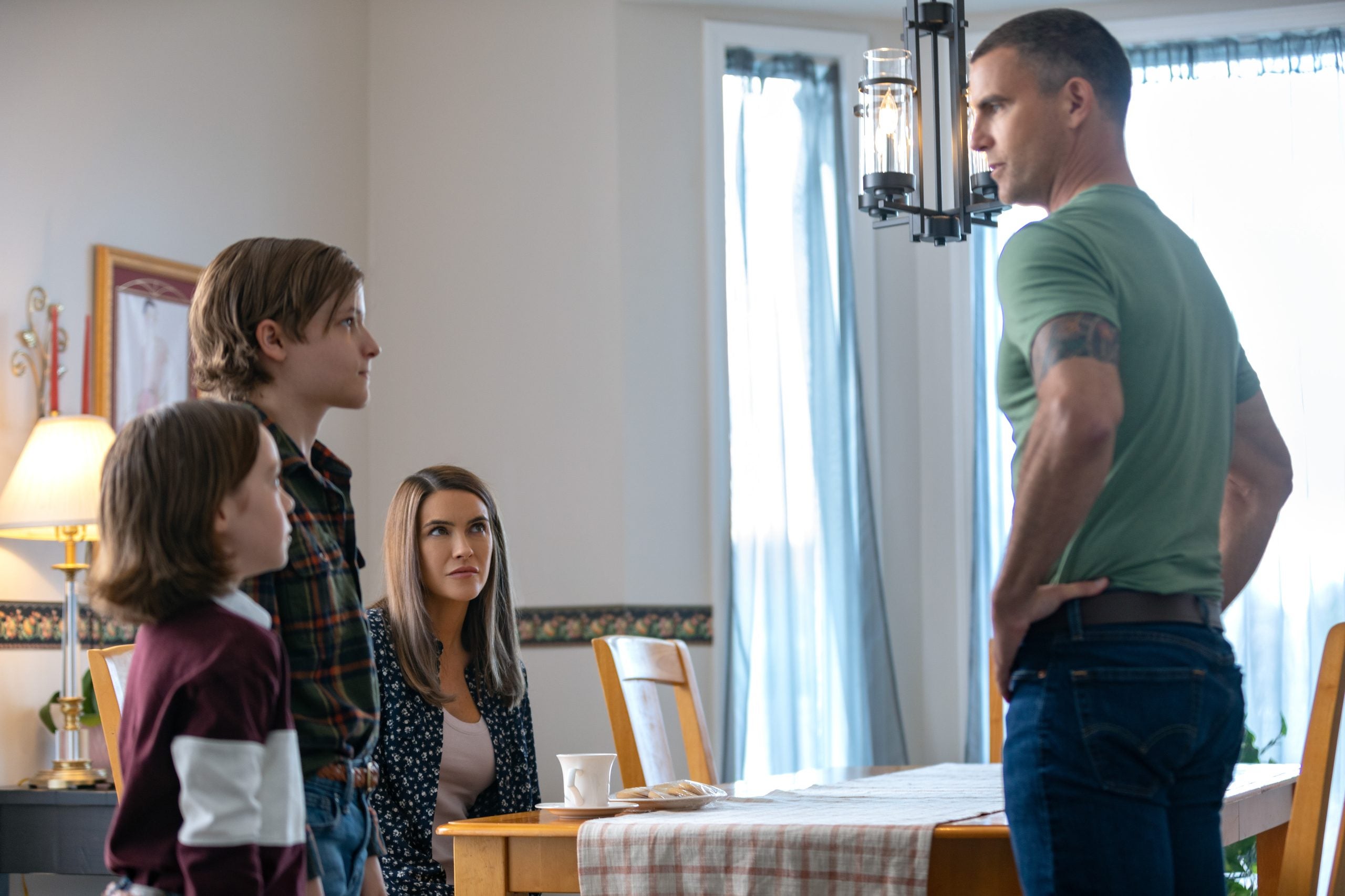 Colin Egglesfield as Randy Rother, looking at Chrishell Stause in 'A Rose for Her Grave' on Lifetime