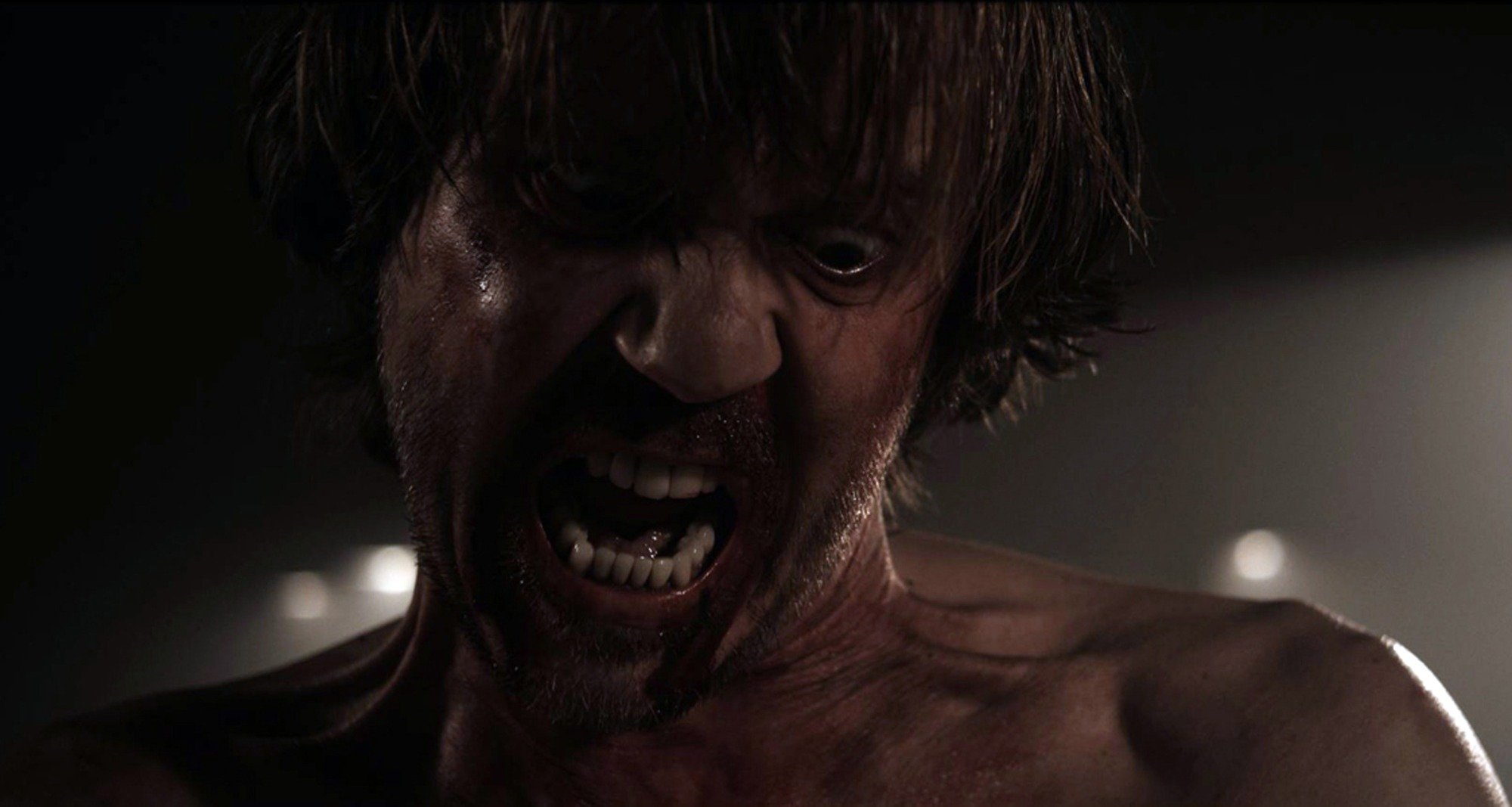 'A Serbian Film 'Srdjan 'Zika' Todorovic as Milos yelling, showing teeth