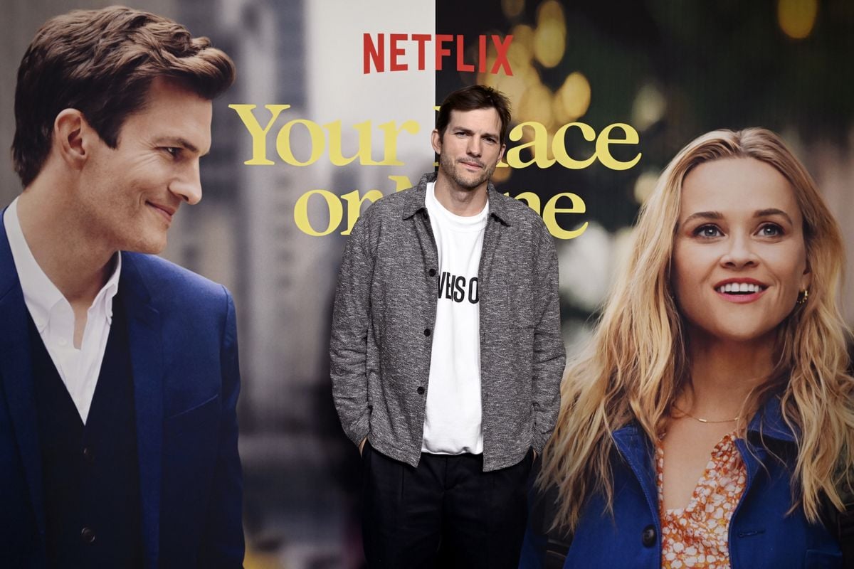 Ashton Kutcher poses in front of a blown up poster featuring key art for "Your Place or Mine"